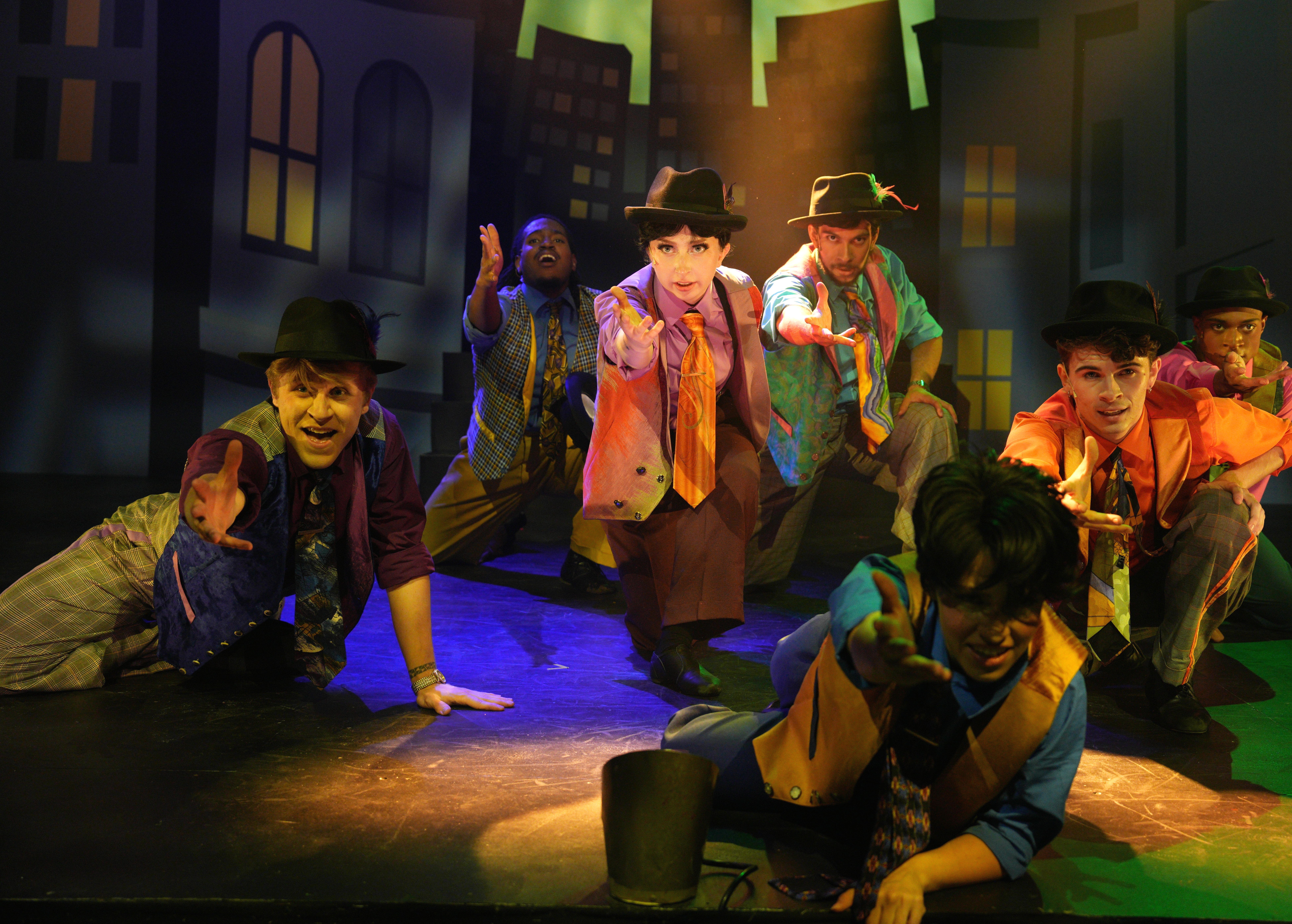 Actors performing a group number