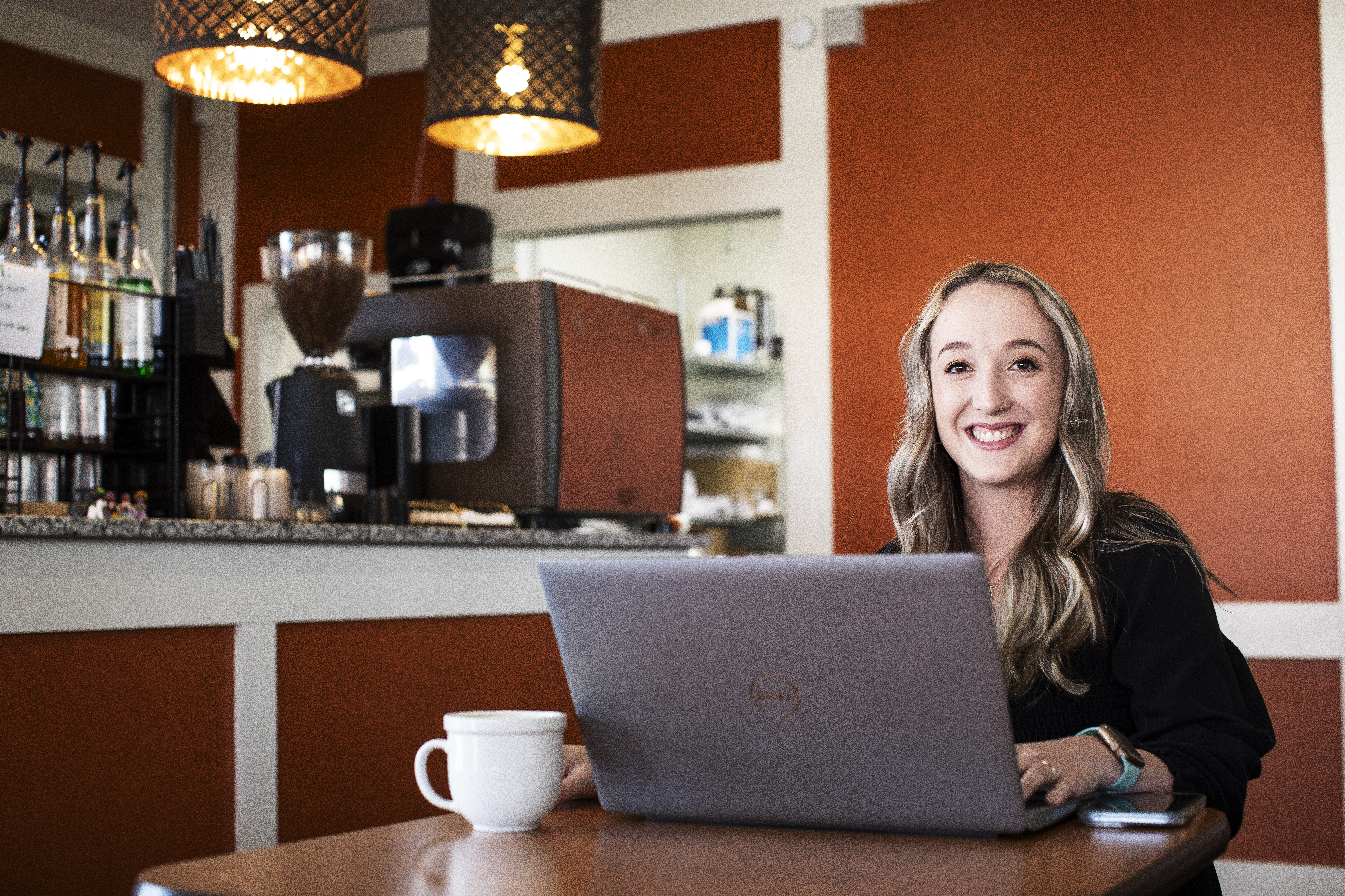 Students on laptop in coffee shop