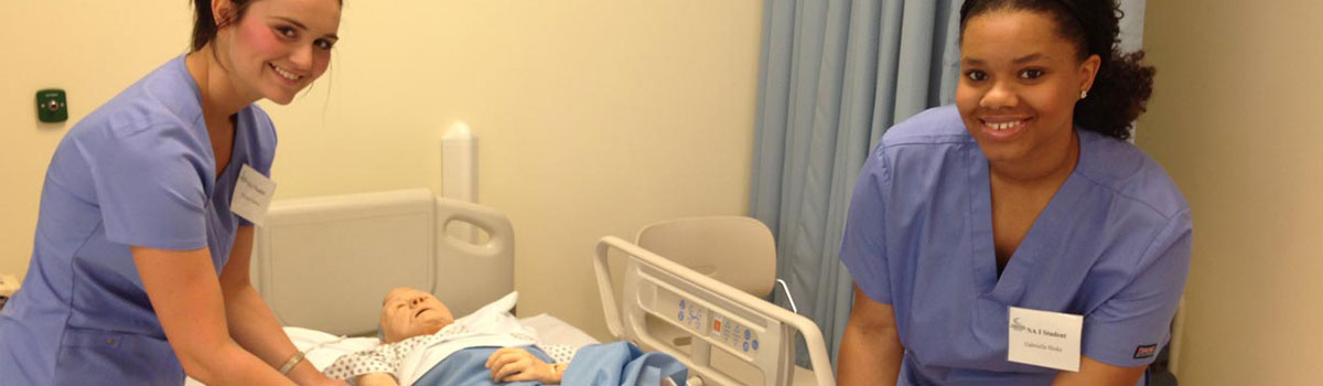 Nurse Aide Students Practicing Patient Care