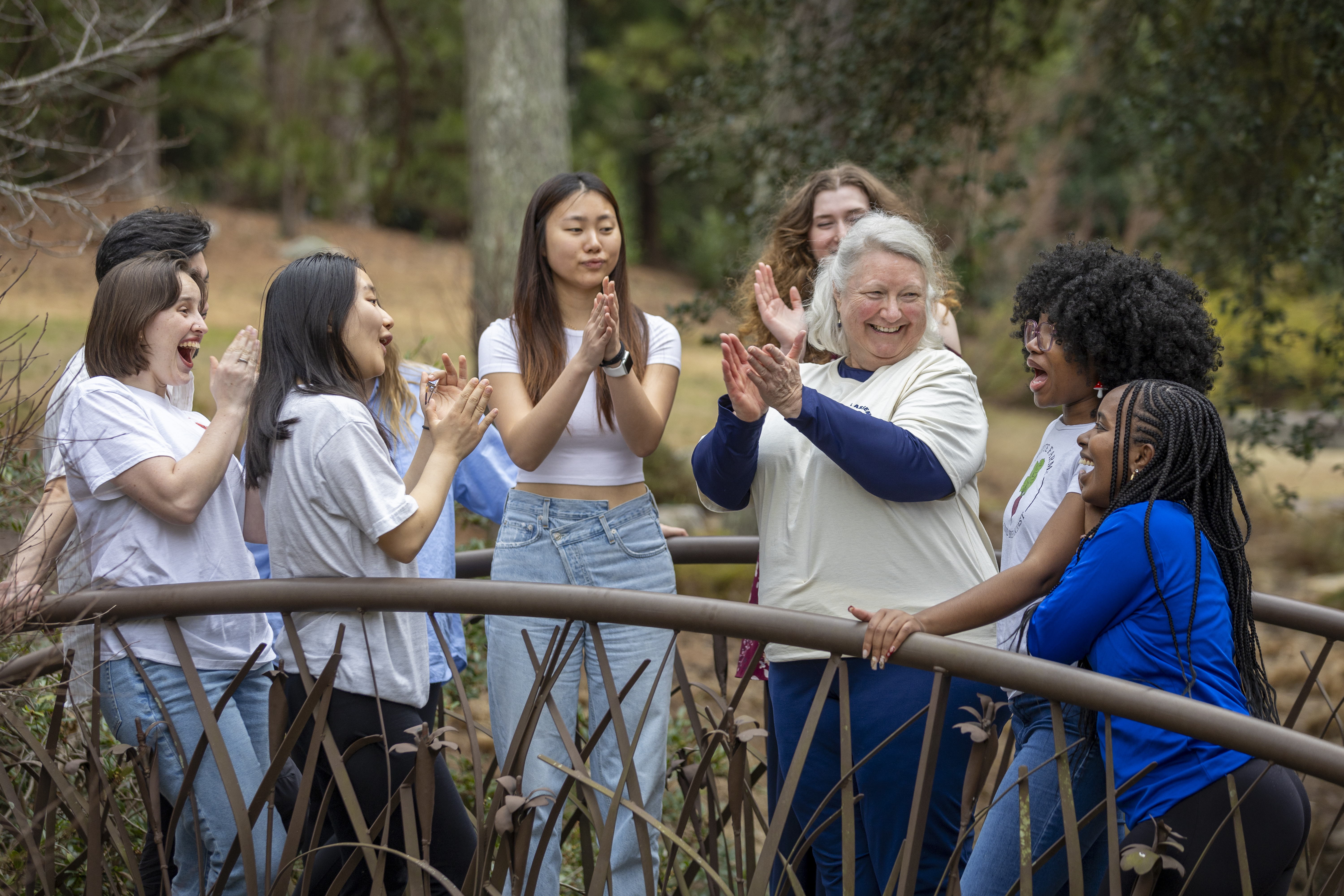 Catherine Admay, senior lecturer in the Sanford School of Public Policy, talks with students after their Strategic Storytelling: Narratives for Development course in Duke Gardens: Jared Lazarus