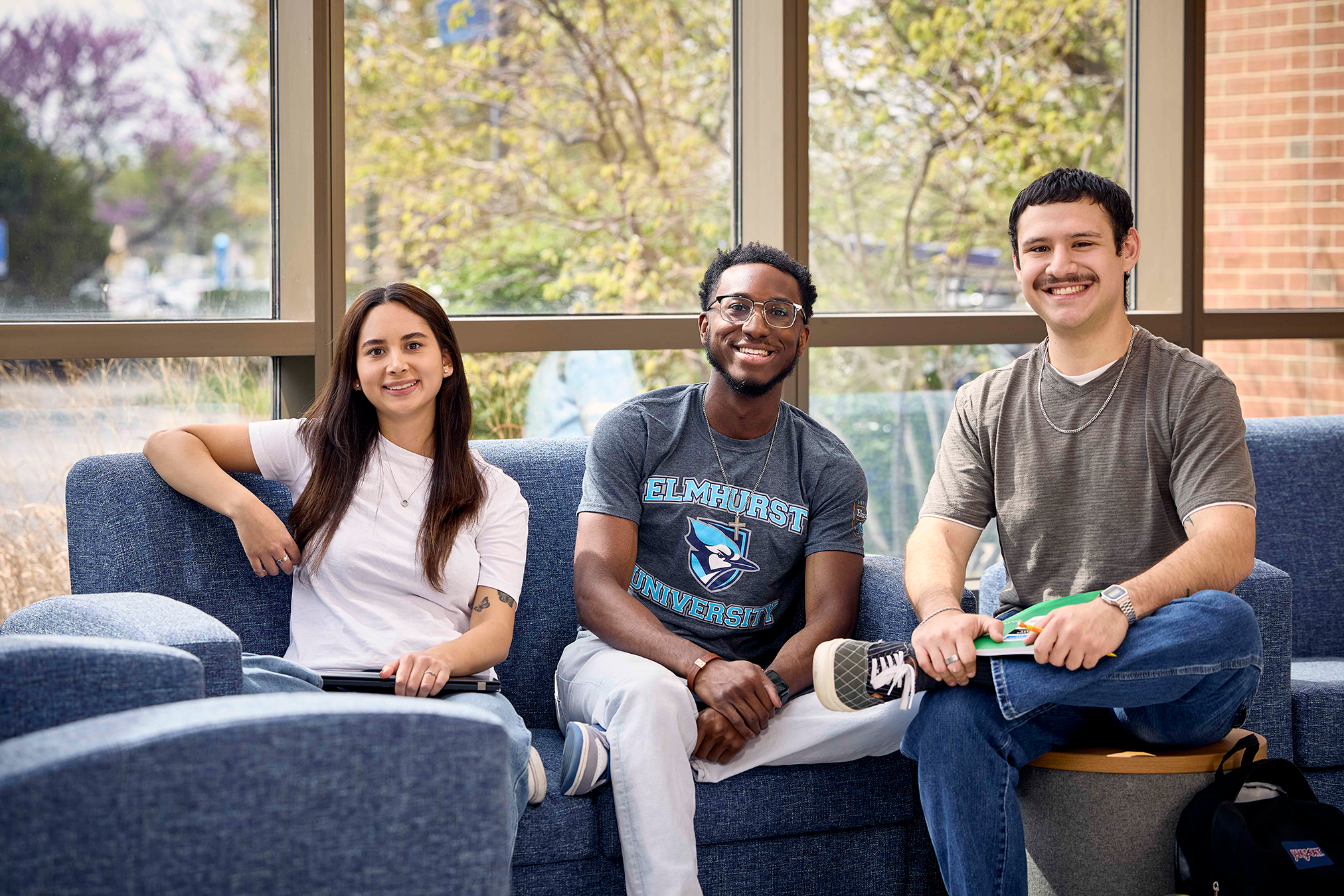 students sitting on couch