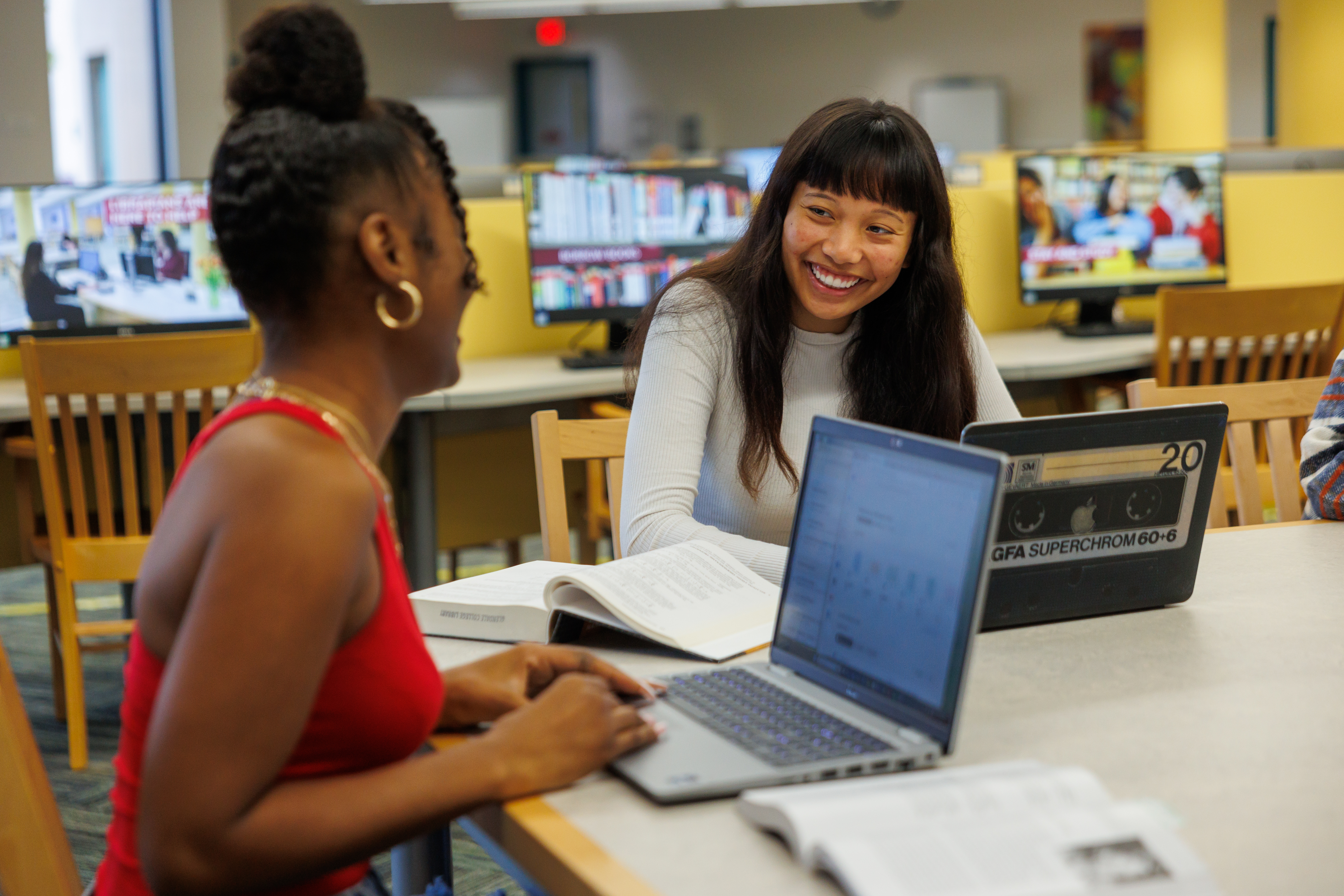Two students in library