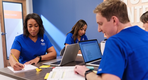 Joyce University students studying as a group.