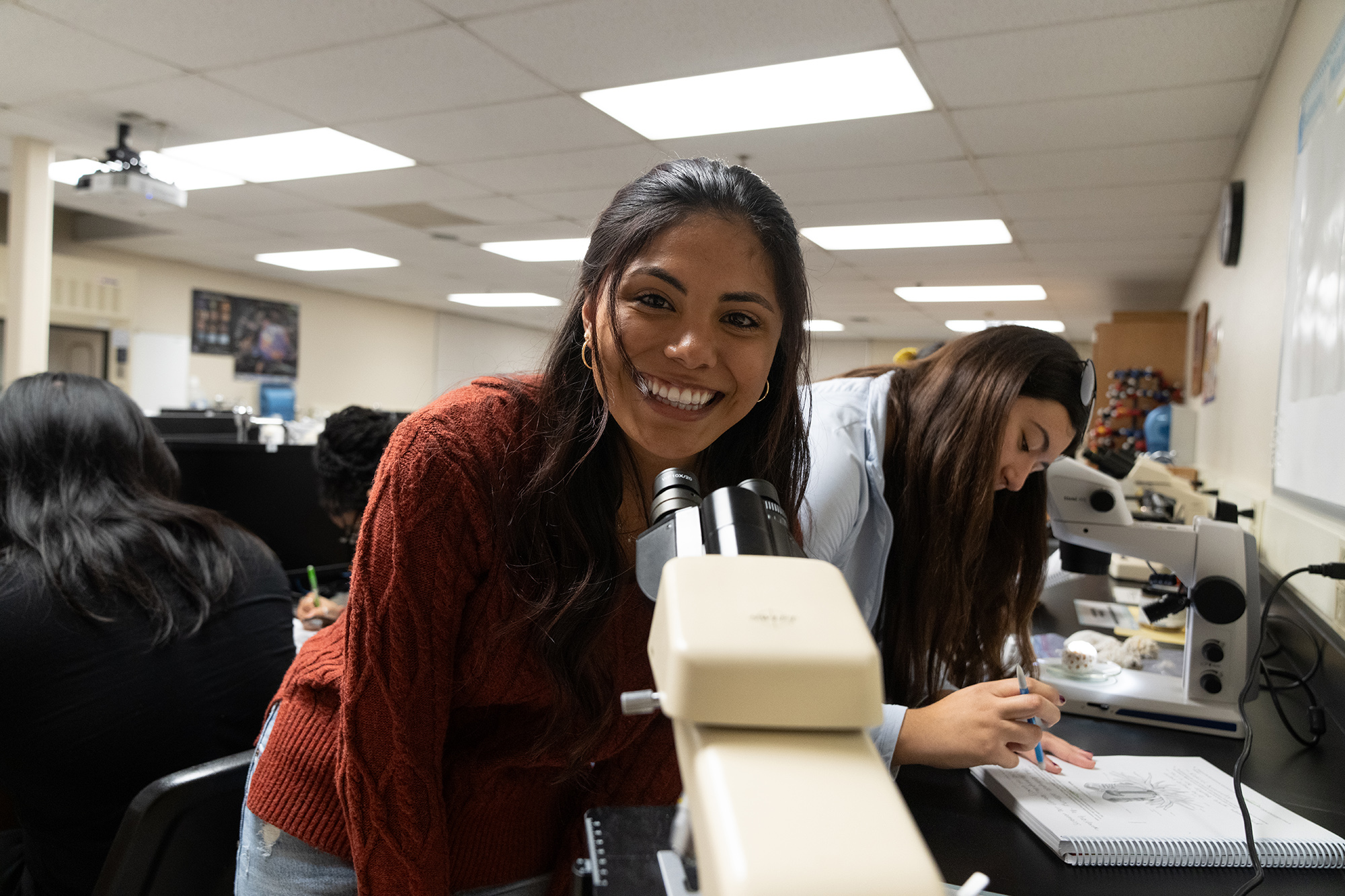 student in a science lab class