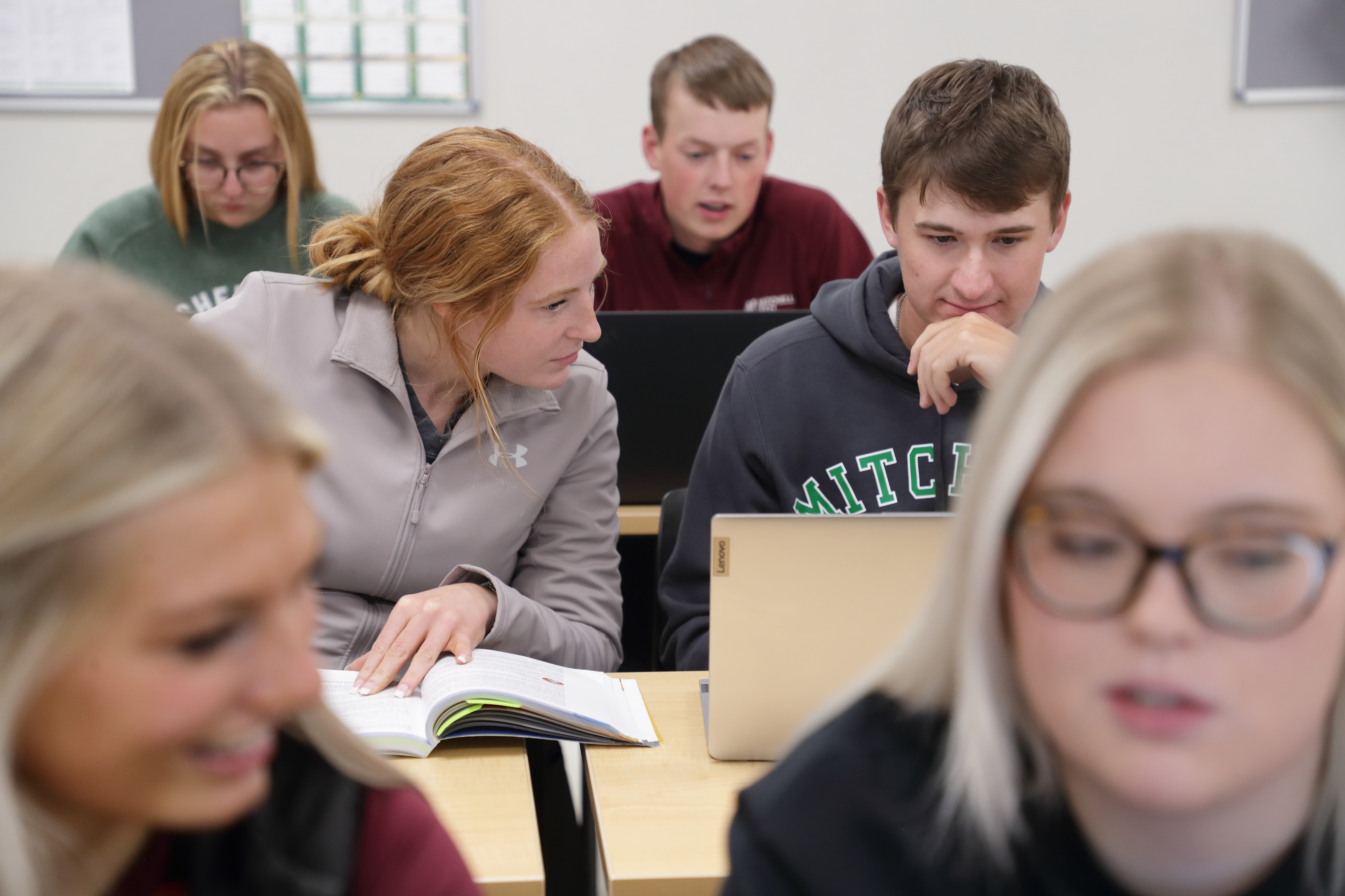 Six Mitchell Tech student in class