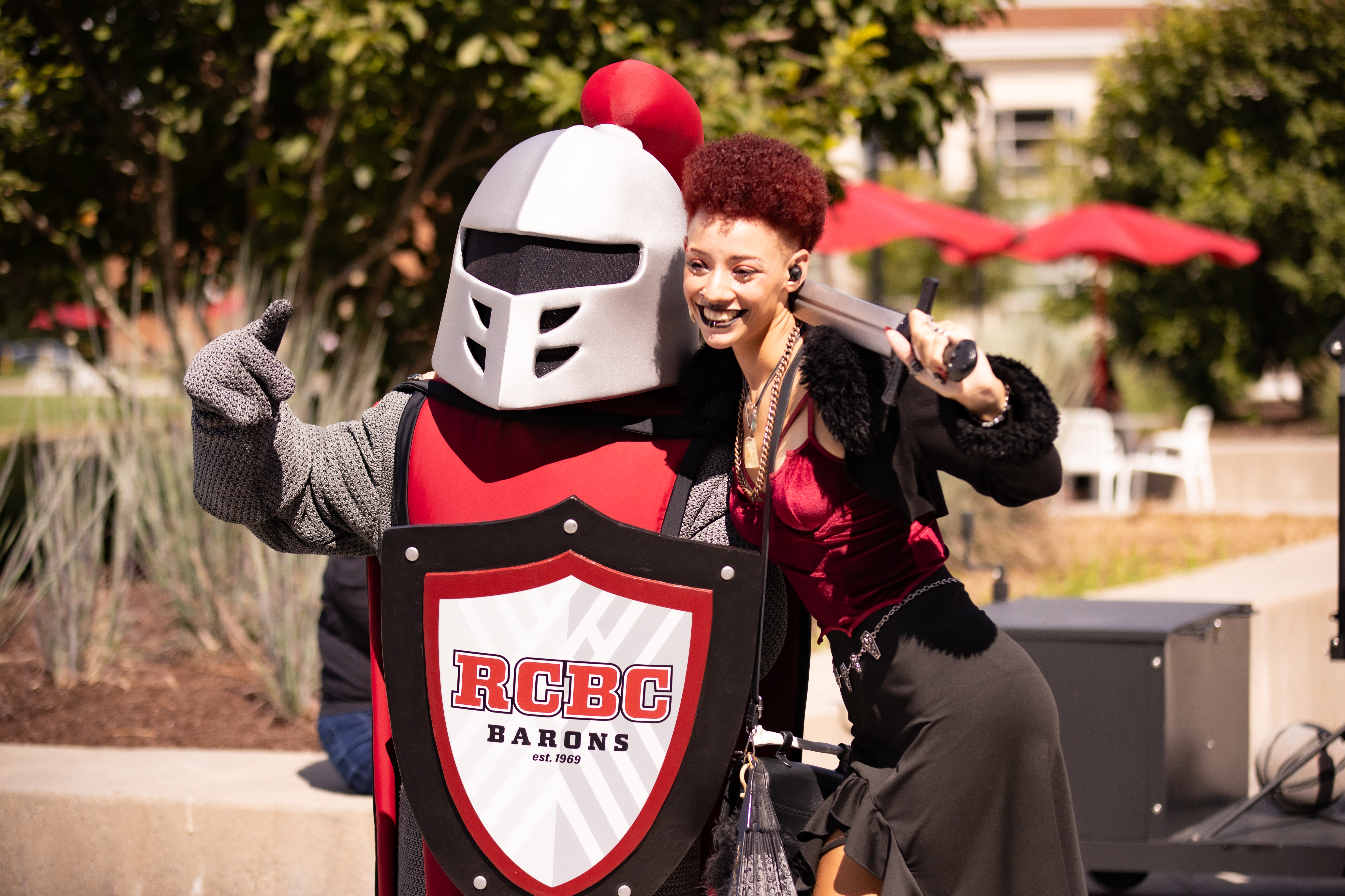 RCBC's mascot, Barry, pointing his sword to a I love RCBC selfie station