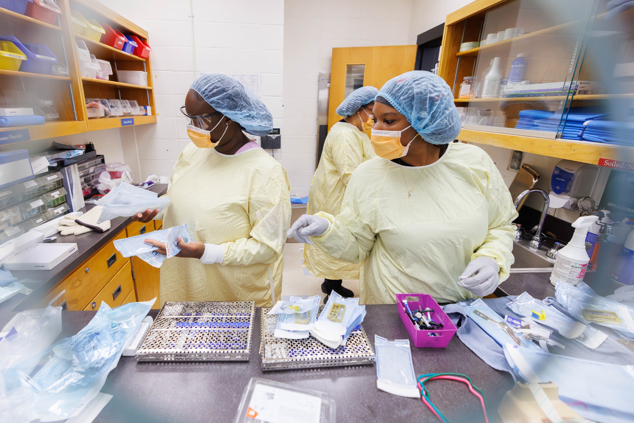 Students working in the dental lab.