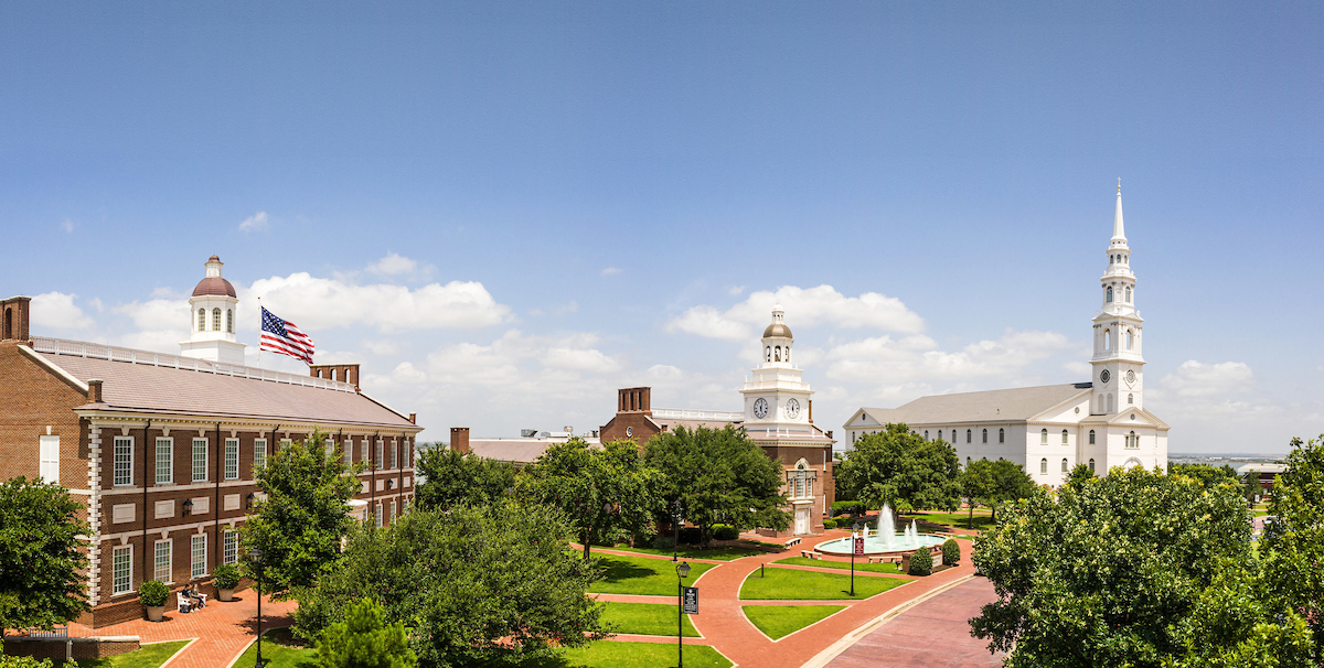 Panoramic picture of the beautiful DBU campus showing Blackaby Hall, Mahler Student Center and Pilgrim Chapel