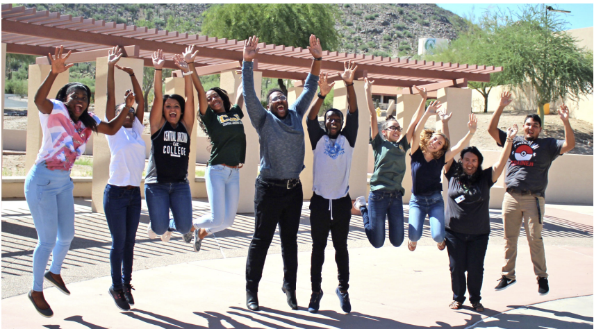 CAC res life leaders jumping in air