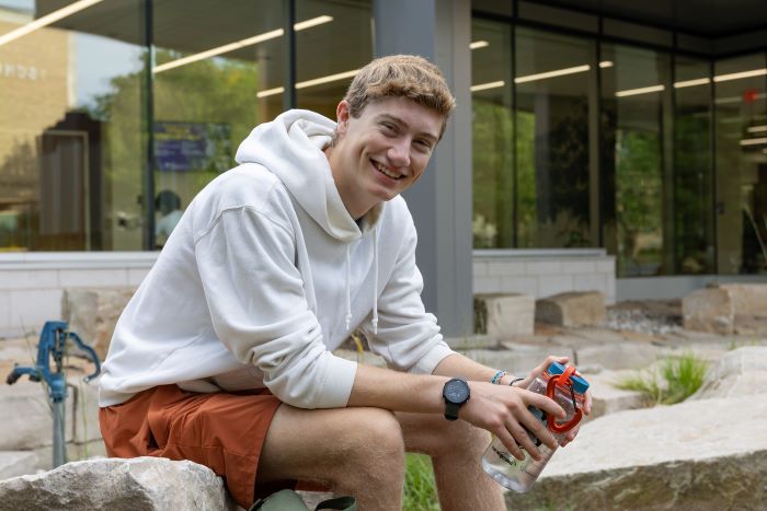 Student sitting outside